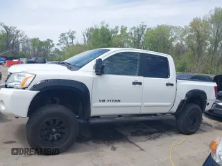 2005 Nissan Titan LE with VIN 1N6AA07BX5N525048, listed as a IAAI auction lot 41984150 with 242,321 mi miles. Bid and sale history available at carsss.com. Image 15.