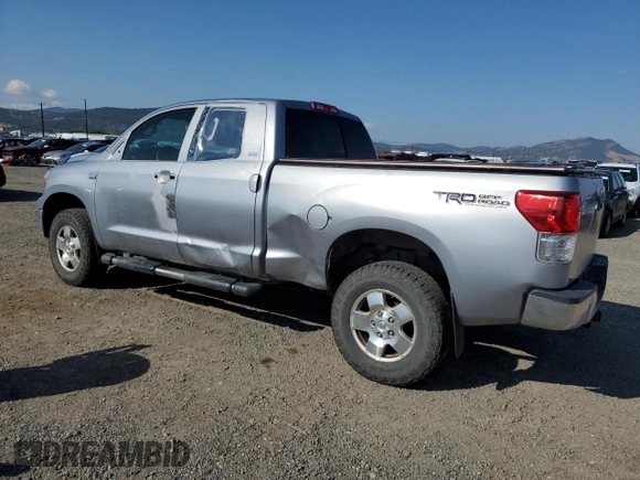 2010 Toyota Tundra 4WD Truck with VIN 5TFUM5F12AX004028, listed as a Copart auction lot 66986614 with 208,393 mi miles and Salvage Title. Bid and sale history available at carsss.com. Image 2.