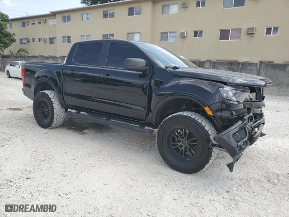 2023 Ford Ranger XL with VIN 1FTER4FHXPLE12564, listed as a Copart auction lot 50187235 with 11,764 mi miles and Salvage Title. Bid and sale history available at carsss.com. Image 4.