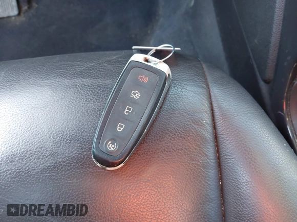 2015 Ford Escape Titanium with VIN 1FMCU0J93FUC02844, listed as a IAAI auction lot 41531293 with 115,392 mi miles and . Bid and sale history available at DreamBid. Image 11.