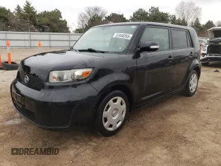 2009 Scion xB with VIN JTLKE50E491063990, listed as a Copart auction lot 53448265 with 152,420 mi miles and Salvage Title. Bid and sale history available at DreamBid. Image 1.