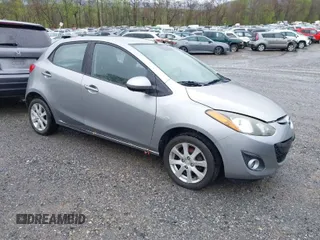 2011 Mazda 2 Sport with VIN JM1DE1HZXB0112402, listed as a IAAI auction lot 41954565 with 153,351 mi miles. Bid and sale history available at carsss.com. Image 1.