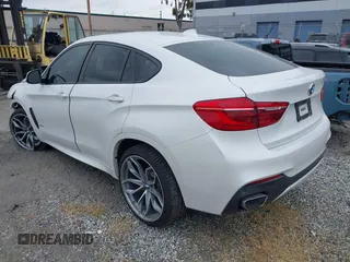 2018 BMW X6 xDrive35i with VIN 5UXKU2C5XJ0X50408, listed as a IAAI auction lot 41798784 with 69,134 mi miles. Bid and sale history available at carsss.com. Image 3.