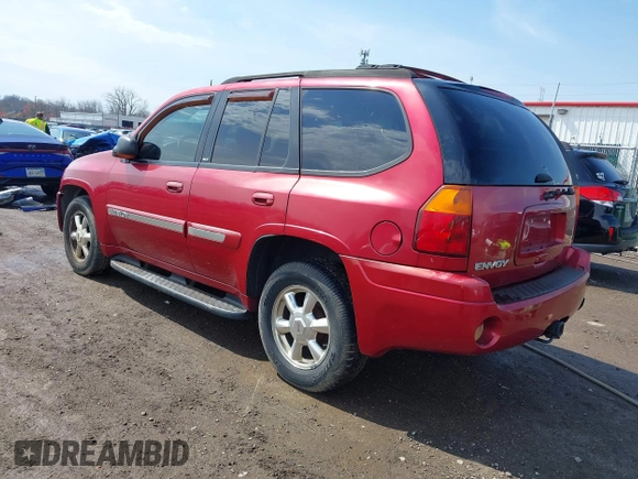 2005 GMC Envoy SLE with VIN 1GKDT13S252127604, listed as a IAAI auction lot 41898390 with 210,655 mi miles. Bid and sale history available at carsss.com. Image 3.