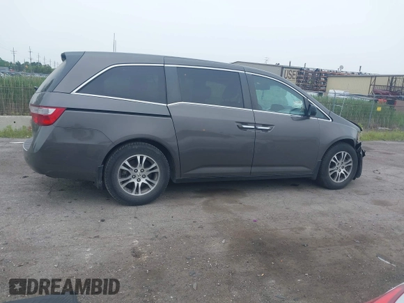 2011 Honda Odyssey EX-L with VIN 5FNRL5H64BB029087, listed as a IAAI auction lot 42508764 with 214,705 mi miles and . Bid and sale history available at DreamBid. Image 13.