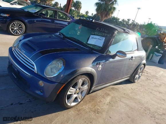 2005 MINI Cooper Convertible S with VIN WMWRH334X5TF81965, listed as a IAAI auction lot 40407947 with NaN miles. Bid and sale history available at carsss.com. Image 2.