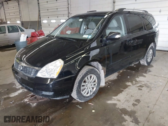 2012 Kia Sedona LX with VIN KNDMG4C78C6435430, listed as a IAAI auction lot 41701890 with 170,128 mi miles. Bid and sale history available at carsss.com. Image 2.