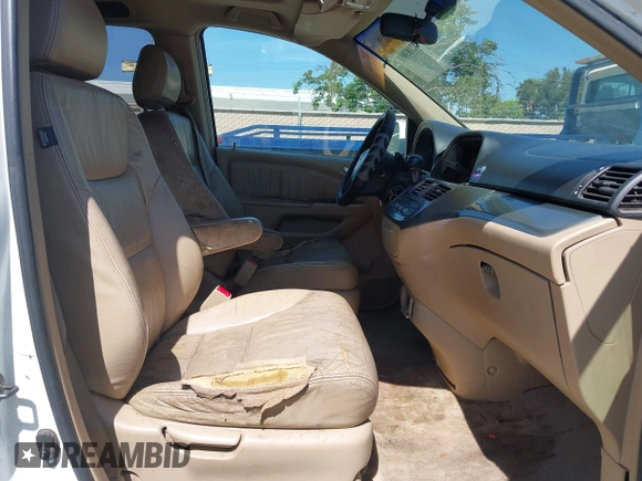 2005 Honda Odyssey EX-L with VIN 5FNRL38605B045246, listed as a IAAI auction lot 42183883 with 164,072 mi miles and . Bid and sale history available at carsss.com. Image 5.