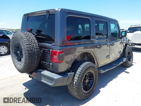 2018 Jeep Wrangler Unlimited Sahara with VIN 1C4HJXEN1JW236779, listed as a IAAI auction lot 42238158 with 72,879 mi miles and . Bid and sale history available at DreamBid. Image 4.