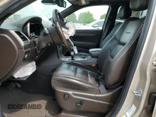 2014 Jeep Grand Cherokee Summit с VIN 1C4RJFJGXEC436797, выставлен на аукционе Copart как лот 60248595 с пробегом 156 395 миль миль и Списание • Salvage title. История ставок и продаж доступна на DreamBid. Изображение 7.