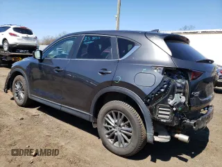 2017 Mazda CX-5 Touring with VIN JM3KFBCL3H0202598, listed as a Copart auction lot 52184325 with 77,740 mi miles and Salvage Title. Bid and sale history available at carsss.com. Image 2.