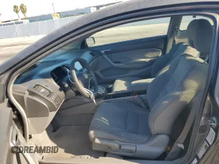 2010 Honda Civic Cpe LX with VIN 2HGFG1B61AH529839, listed as a Copart auction lot 69501724 with 218,443 mi miles and Salvage Title. Bid and sale history available at carsss.com. Image 7.