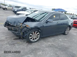 2006 Acura TSX Navi with VIN JH4CL96906C005218, listed as a IAAI auction lot 41633071 with 216,581 mi miles and . Bid and sale history available at DreamBid. Image 2.