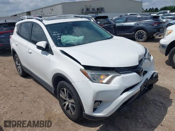 2017 Toyota RAV4 XLE with VIN JTMWFREV8HJ118885, listed as a IAAI auction lot 42097180 with 122,481 mi miles. Bid and sale history available at carsss.com. Image 1.