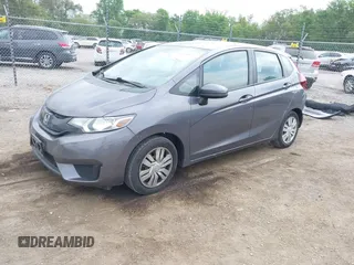 2015 Honda Fit LX with VIN 3HGGK5H58FM722880, listed as a IAAI auction lot 42276261 with 104,886 mi miles and . Bid and sale history available at DreamBid. Image 18.