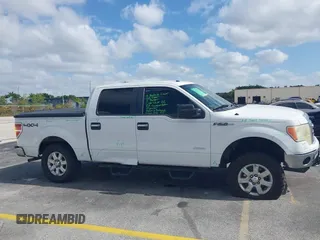 2013 Ford F-150 XL with VIN 1FTFW1ET1DFA58297, listed as a IAAI auction lot 42117924 with 202,830 mi miles and . Bid and sale history available at carsss.com. Image 6.