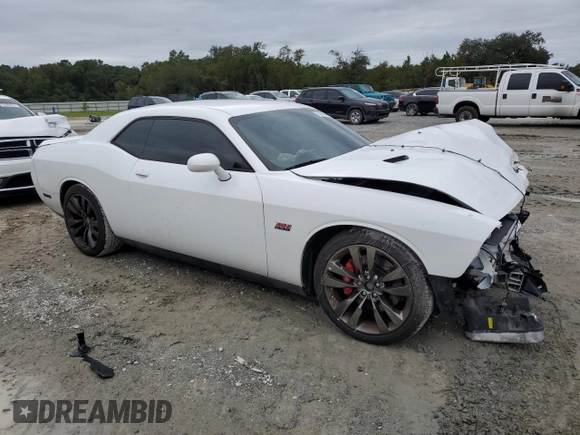 2014 Dodge Challenger SRT-8 z VIN 2C3CDYCJ1EH258264, wystawiony jako Copart lot #75100064 z przebiegiem 105 432 mil mil oraz Szkoda całkowita • Salvage title. Historia ofert i sprzedaży dostępna na DreamBid. Obrazek 4.