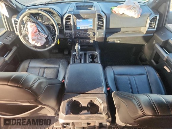 2018 Ford F-150 XL with VIN 1FTEW1E51JFE24106, listed as a Copart auction lot 63447235 with 32,509 mi miles and Salvage title. Bid and sale history available at DreamBid. Image 8.