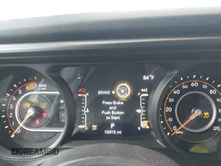 2024 Jeep Wrangler Sport S with VIN 1C4PJXDN8RW370133, listed as a IAAI auction lot 42453029 with 10,415 mi miles and . Bid and sale history available at DreamBid. Image 7.