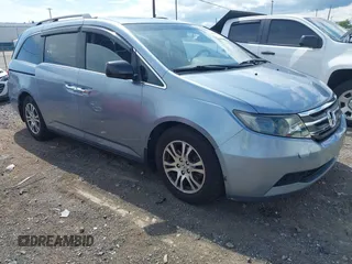 2011 Honda Odyssey EX-L with VIN 5FNRL5H67BB039483, listed as a IAAI auction lot 42676346 with 291,471 mi miles and . Bid and sale history available at DreamBid. Image 1.