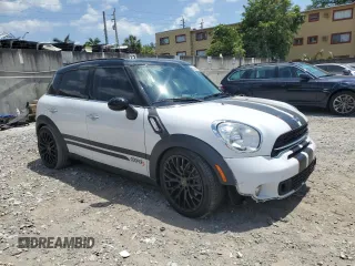 2016 MINI Countryman S with VIN WMWZC3C53GWT08355, listed as a Copart auction lot 53240215 with 62,674 mi miles and Salvage Title. Bid and sale history available at DreamBid. Image 4.