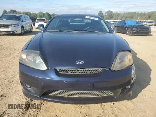 2005 Hyundai Tiburon GT z VIN KMHHN65F85U158764, wystawiony jako Copart lot #80060884 z przebiegiem 121 747 mil mil oraz Czysty tytuł • Clean title. Historia ofert i sprzedaży dostępna na DreamBid. Obrazek 5.