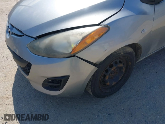 2012 Mazda 2 Sport with VIN JM1DE1KY1C0142339, listed as a IAAI auction lot 42227688 with 259,568 mi miles and . Bid and sale history available at DreamBid. Image 6.