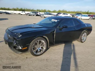 2012 Dodge Challenger SXT Plus with VIN 2C3CDYAG7CH217397, listed as a Copart auction lot 48550045 with 108,025 mi miles and Salvage Title. Bid and sale history available at carsss.com. Image 1.