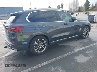 2021 BMW X5 xDrive45e with VIN 5UXTA6C09M9D26035, listed as a IAAI auction lot 41788981 with 60,571 mi miles and . Bid and sale history available at DreamBid. Image 4.