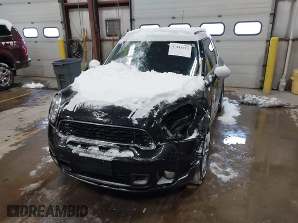 2014 MINI Countryman S with VIN WMWZC5C57EWP39161, listed as a IAAI auction lot 41342912 with 108,459 mi miles and . Bid and sale history available at DreamBid. Image 12.