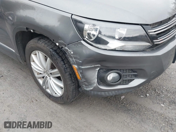 2013 Volkswagen Tiguan SE with VIN WVGAV7AX9DW547633, listed as a IAAI auction lot 42009704 with 51,826 mi miles and . Bid and sale history available at DreamBid. Image 6.