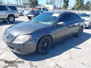 2006 Nissan Altima 2.5 with VIN 1N4AL11D06N405201, listed as a IAAI auction lot 41817603 with 160,179 mi miles. Bid and sale history available at carsss.com. Image 2.