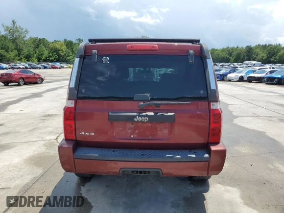 2007 Jeep Commander Sport z VIN 1J8HG48K27C527423, wystawiony jako Copart lot #63448765 z przebiegiem 212 856 mil mil oraz Szkoda całkowita • Salvage title. Historia ofert i sprzedaży dostępna na DreamBid. Obrazek 6.