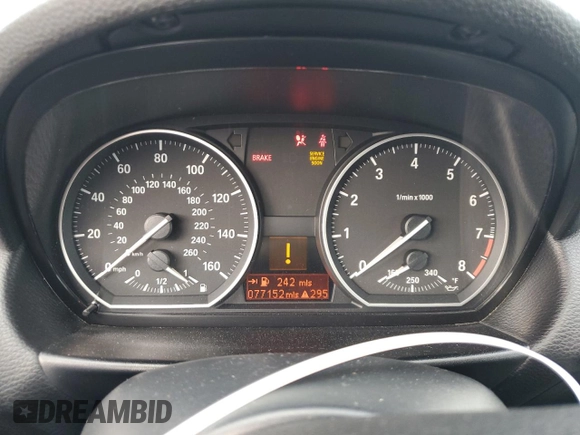 2012 BMW 1 Series 135i with VIN WBAUN7C59CVM26082, listed as a Copart auction lot 74711754 with 77,152 mi miles and Salvage title. Bid and sale history available at DreamBid. Image 9.