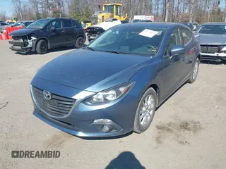 2015 Mazda 3 i Touring with VIN JM1BM1L75F1269755, listed as a IAAI auction lot 41634437 with 86,695 mi miles and . Bid and sale history available at carsss.com. Image 2.