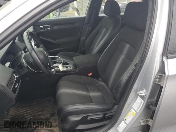 2022 Honda Civic Sport z VIN 2HGFE2F57NH597601, wystawiony jako Copart lot #55588515 z przebiegiem 12 576 mil mil oraz Szkoda całkowita • Salvage title. Historia ofert i sprzedaży dostępna na DreamBid. Obrazek 7.