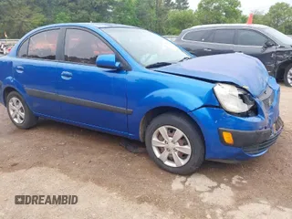 2009 Kia Rio SX with VIN KNADE223996508478, listed as a IAAI auction lot 41912755 with 157,556 mi miles. Bid and sale history available at carsss.com. Image 1.
