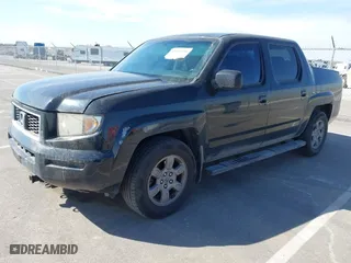 2007 Honda Ridgeline RTX with VIN 2HJYK16377H515373, listed as a IAAI auction lot 41912195 with 200,683 mi miles. Bid and sale history available at carsss.com. Image 2.