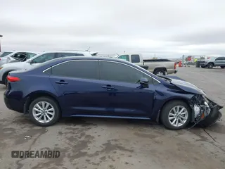2023 Toyota Corolla Hybrid LE with VIN JTDBCMFE8PJ003081, listed as a IAAI auction lot 41041004 with 19,146 mi miles. Bid and sale history available at carsss.com. Image 13.