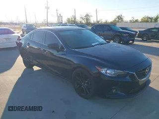 2015 Mazda 6 i Grand Touring with VIN JM1GJ1W58F1201507, listed as a IAAI auction lot 40916832 with 78,322 mi miles and . Bid and sale history available at DreamBid. Image 1.