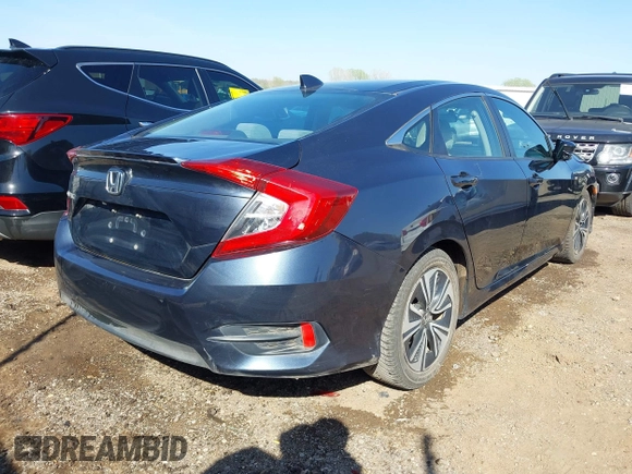 2016 Honda Civic Sedan EX-T with VIN 19XFC1F30GE025233, listed as a IAAI auction lot 41987604 with 129,311 mi miles. Bid and sale history available at carsss.com. Image 4.
