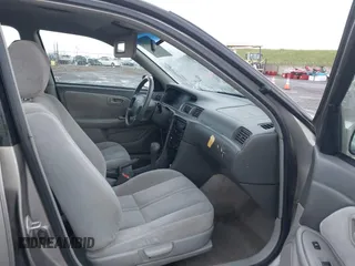 2000 Toyota Camry CE z VIN 4T1BG22K3YU691054, wystawiony jako IAAI lot #41896526 z przebiegiem 303 993 mil mil oraz . Historia ofert i sprzedaży dostępna na DreamBid. Obrazek 5.