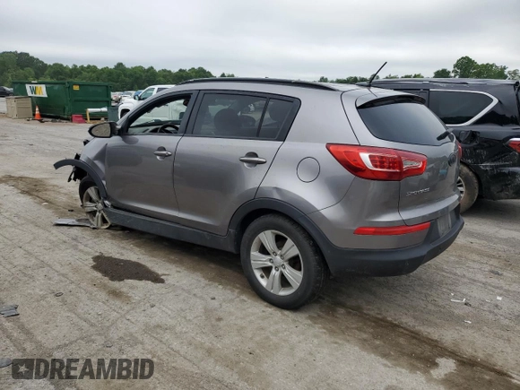 2012 Kia Sportage LX z VIN KNDPB3A20C7217165, wystawiony jako Copart lot #60999525 z przebiegiem 128 231 mil mil oraz Szkoda całkowita • Salvage title. Historia ofert i sprzedaży dostępna na DreamBid. Obrazek 2.