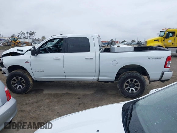 2023 Ram 2500 Big Horn with VIN 3C6UR5DL5PG650271, listed as a IAAI auction lot 41805374 with 27,395 mi miles and . Bid and sale history available at DreamBid. Image 15.