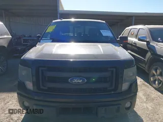 2014 Ford F-150 XL with VIN 1FTFX1CT7EFD11303, listed as a IAAI auction lot 41414356 with 183,586 mi miles. Bid and sale history available at carsss.com. Image 12.