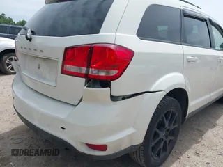 2014 Dodge Journey SXT z VIN 3C4PDCBBXET135001, wystawiony jako IAAI lot #42318360 z przebiegiem 152 321 mil mil oraz . Historia ofert i sprzedaży dostępna na DreamBid. Obrazek 12.
