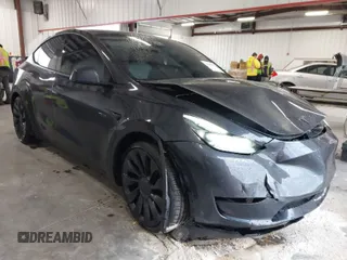 2024 Tesla Model Y Performance with VIN 7SAYGDEFXRF049338, listed as a IAAI auction lot 41240812 with 10,132 mi miles and . Bid and sale history available at DreamBid. Image 1.