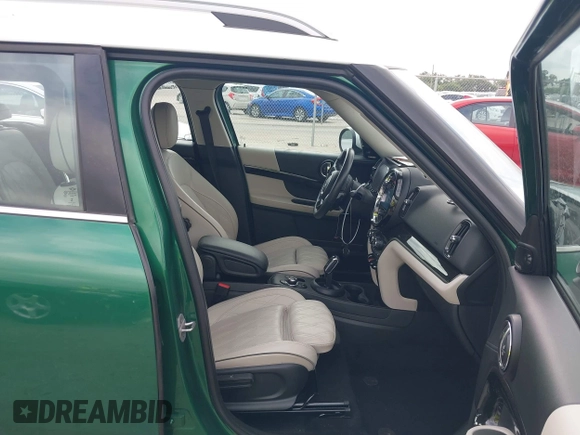 2023 MINI Countryman Cooper S with VIN WMZ83BR09P3P96362, listed as a IAAI auction lot 42535827 with 50,236 mi miles and . Bid and sale history available at DreamBid. Image 5.