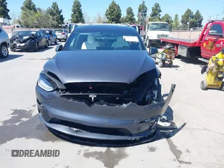 2022 Tesla Model X with VIN 7SAXCAE59NF360301, listed as a IAAI auction lot 41945059 with Not Provided miles and . Bid and sale history available at DreamBid. Image 12.
