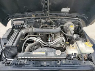 2006 Jeep Wrangler X with VIN 1J4FA39SX6P719070, listed as a Copart auction lot 55598455 with 110,741 mi miles and Salvage title. Bid and sale history available at DreamBid. Image 12.